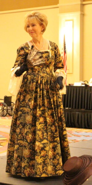 Shari Cunningham wearing an 18th century dress