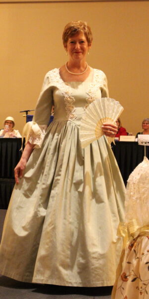 JoAnne Williams wearing an 18th century dress