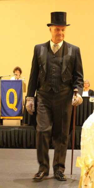Don Cyr wearing a Victorian gentleman’s dress suit from the late 1800s